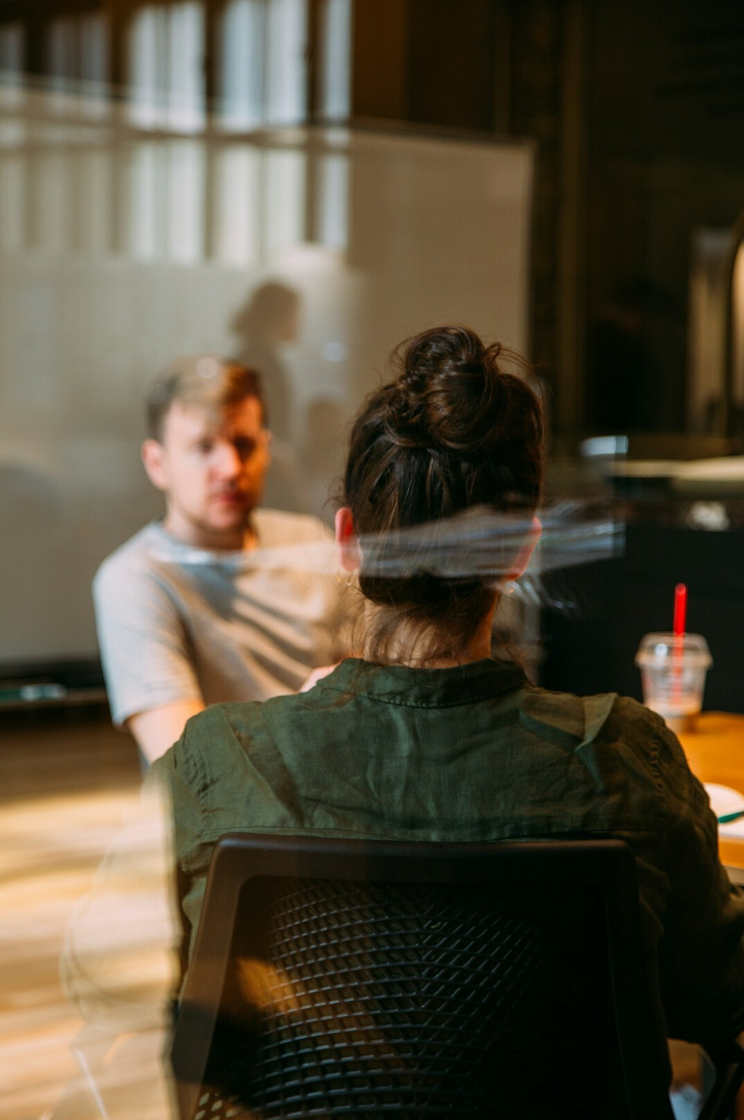 person speaking in meeting