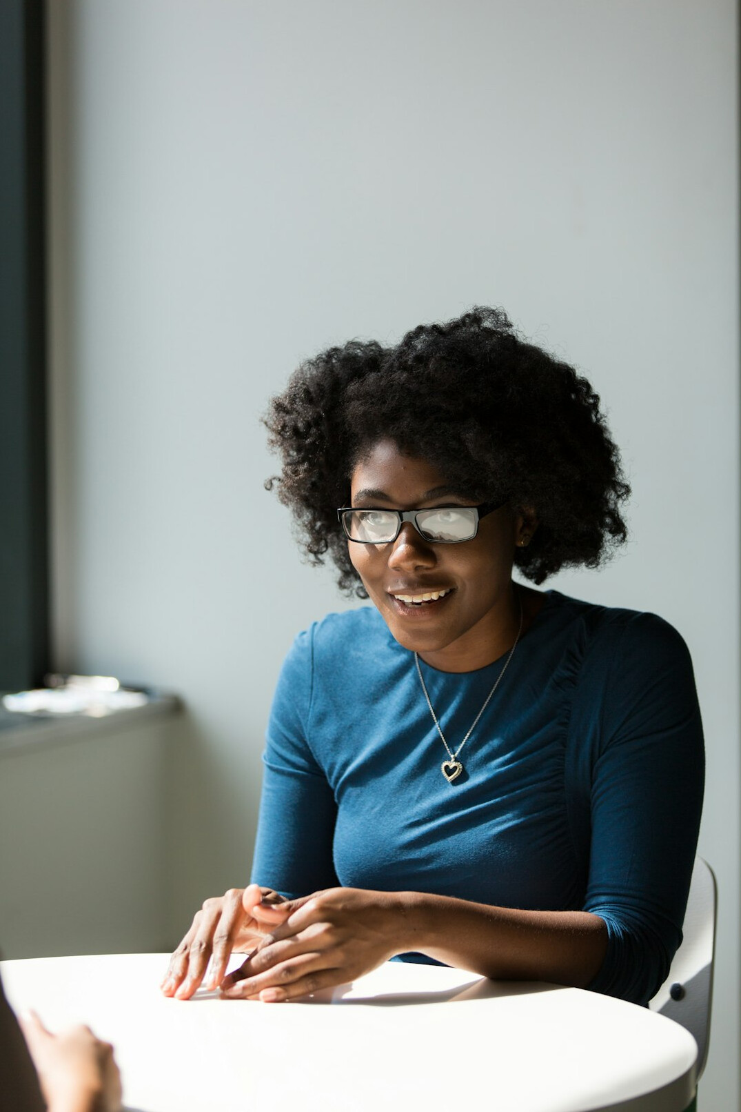 person speaking in meeting
