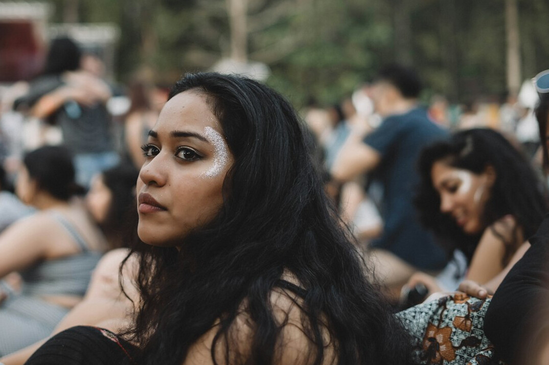 Brazilian woman speaking confidently to a group