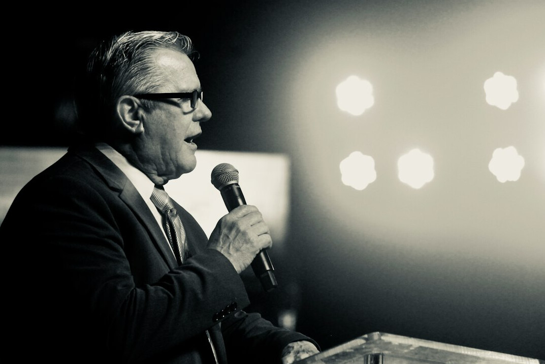 inspirational leader speaking on stage