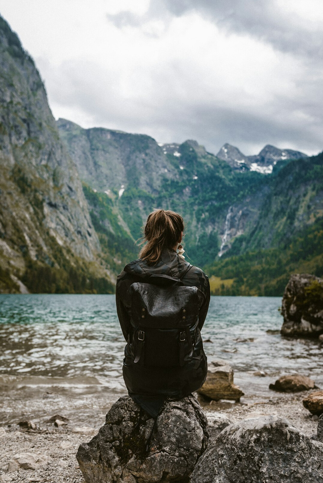 person meditating outdoors